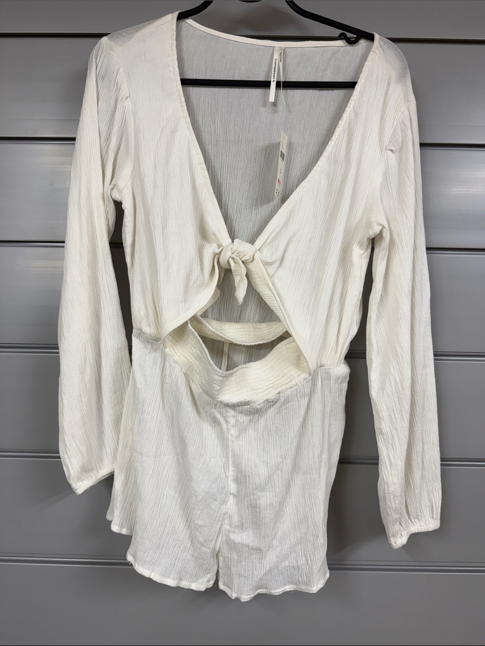 Women’s Cream Tie-Front Long Sleeve romper by Anthropologie